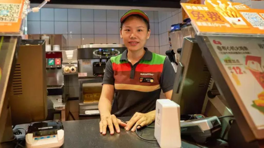 Chinese employee working at Burger King in Shenzhen, China