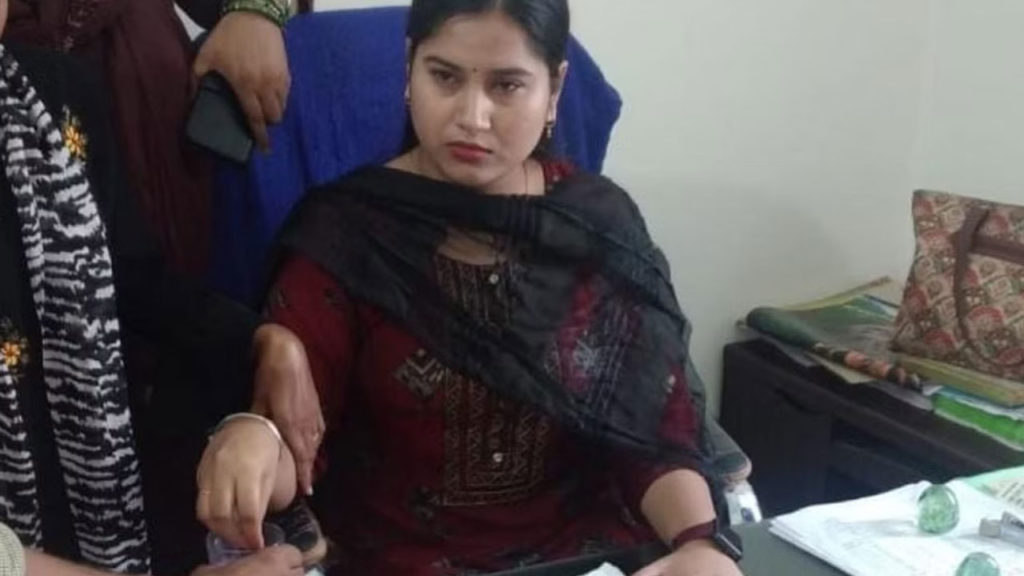 Assistant Registrar Mitali Sharma arrested red handed taking bribe on the first day of posting