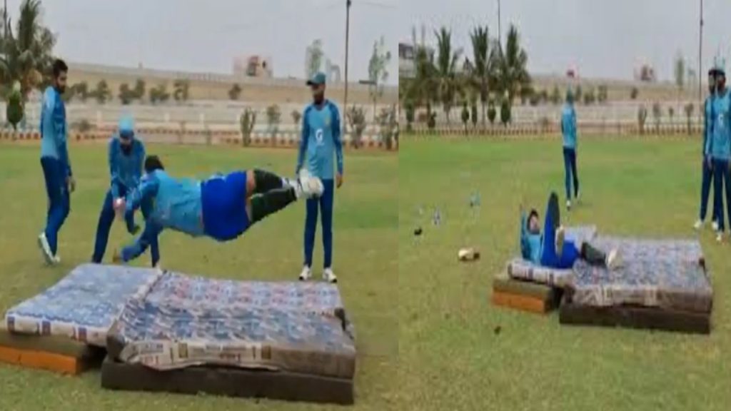 Pakistan cricketers perform fielding drills on mattresses