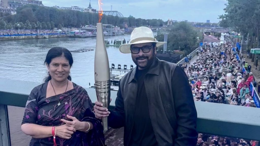 Megastar Chiranjeevi Shares a Photo with Olympic Torch From Paris Olympics 2024